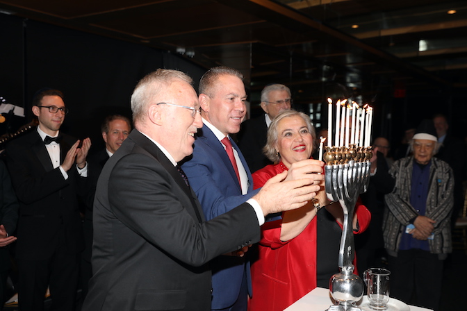 The three diplomats lit Hanukkah candles together at the Gala’s menorah lighting ceremony.