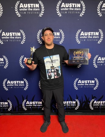 Jake Huberman at Austin Under the Stars Festival, where Following Tupac won the Best Documentary Award and the Audience Choice Award