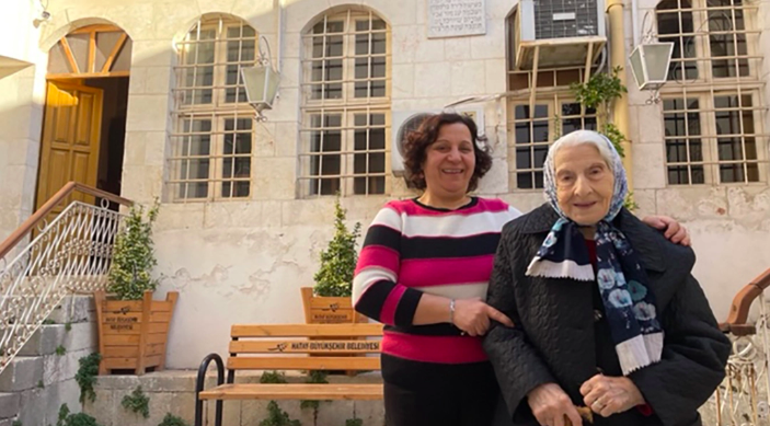 Olga stands with her husband’s 90-year-old mother, Adile, in Antakya. (David I. Klein)