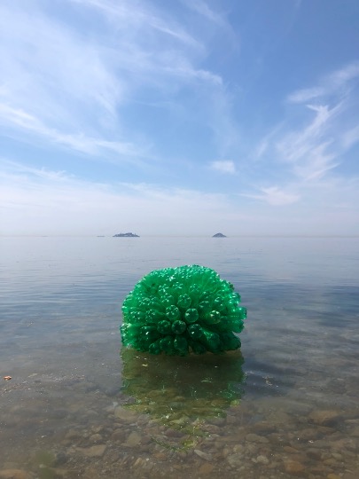 Floating Bottle Installation by Koenraad Marinus Van Lier