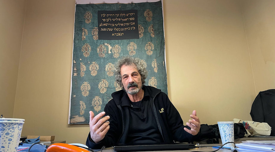 Nesim Bencoya speaks from his office next to the restored Sinyora Synagogue in Izmir. (David I. Klein)